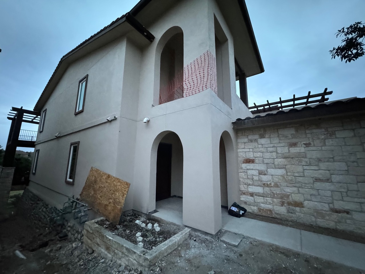 Residence after the exterior finish was restored