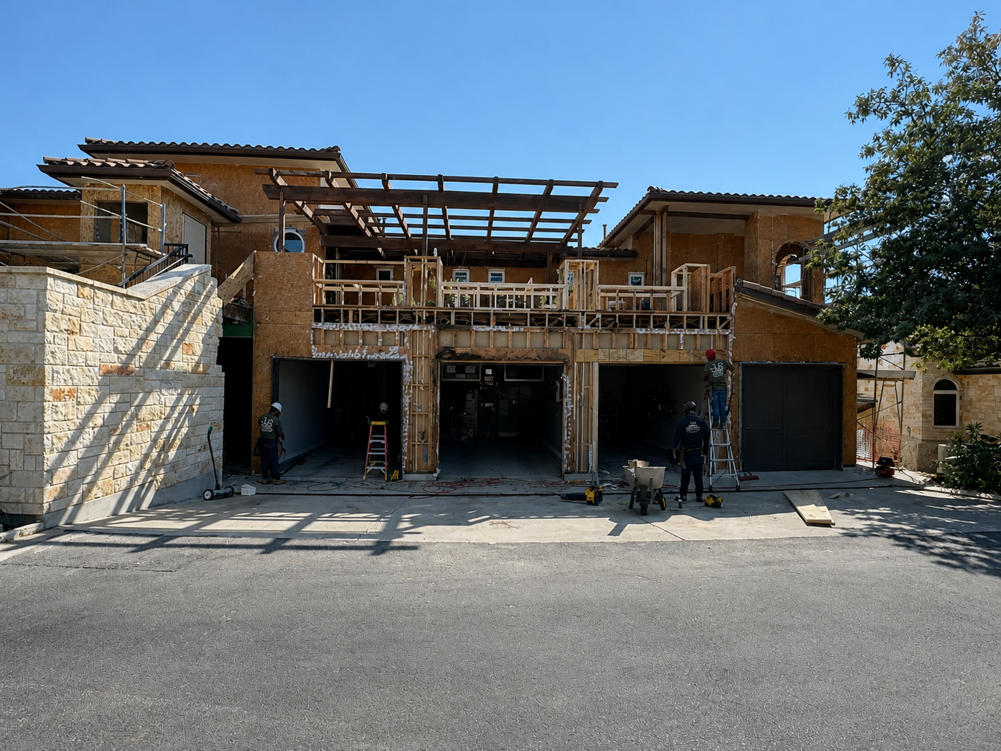 Garage facade rebuilt with new wood sheathing